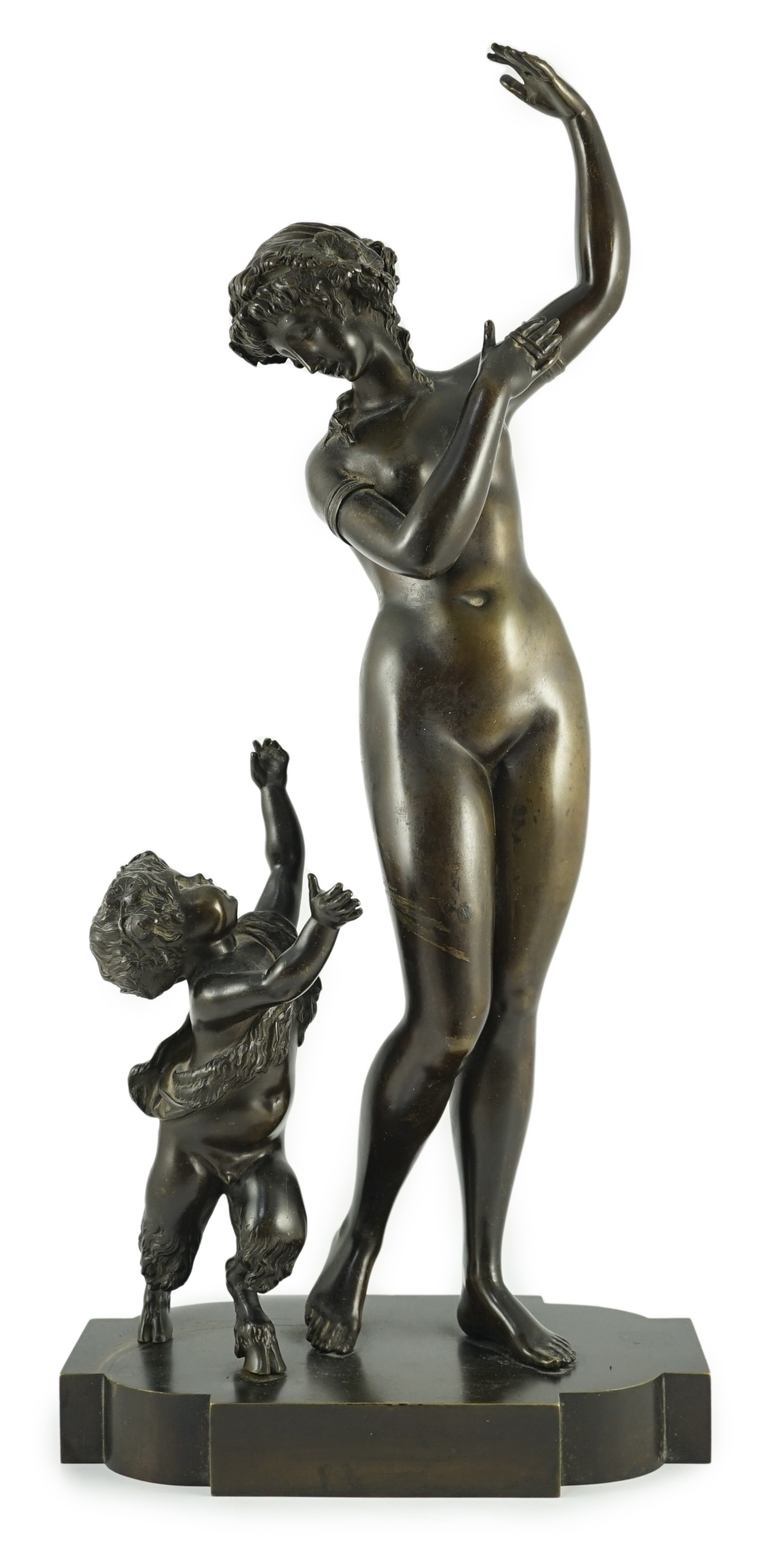 A 19th century French bronze group of a muse dancing alongside a faun, 24cm wide, 52cm high